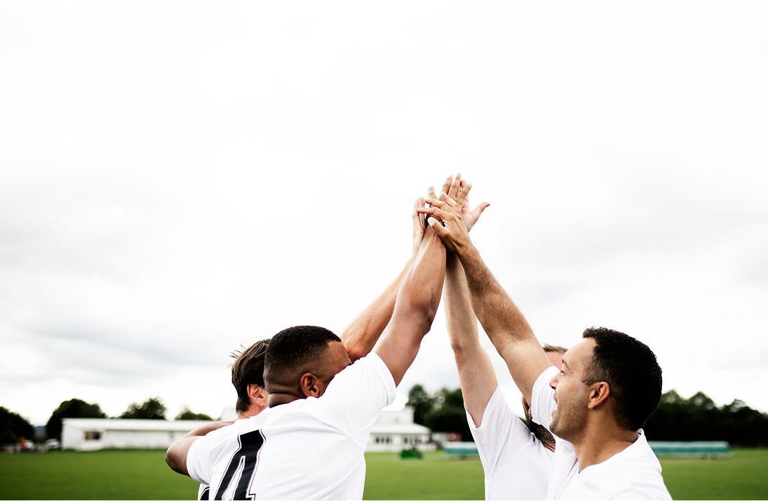 group-of-football-players-doing-a-high-five-2026-01-07-23-36-32-utc 1